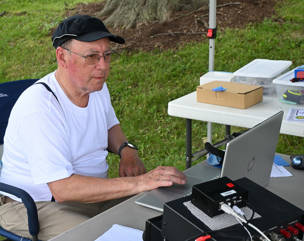 Field Day setup with antennas and tents